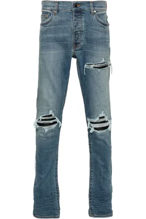 AMIRI Jean MX1 skinny à effet usé