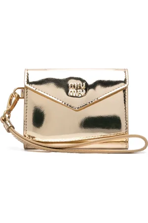 Miu Miu Porte-monnaie verni à logo embossé