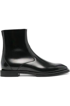Alexander McQueen Bottines à talon gravé