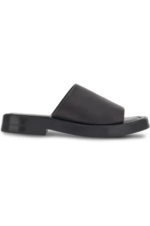 Salvatore Ferragamo Claquettes en cuir à brides croisées