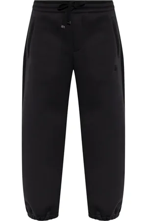 Alexander McQueen Pantalon de jogging à détail tête de mort