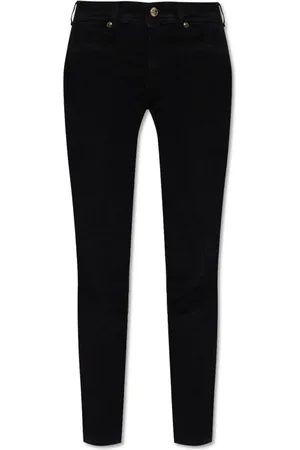VERSACE Legging crop en jean