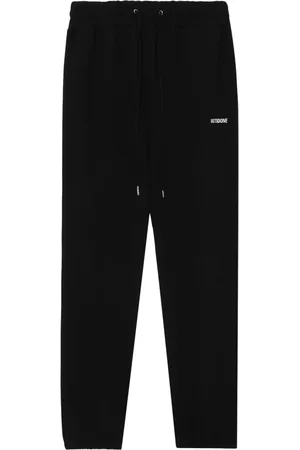We11 Done Pantalon de jogging en coton à logo imprimé