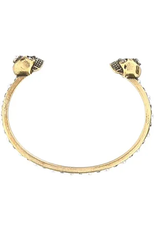 Alexander McQueen Bracelet torque à têtes de mort