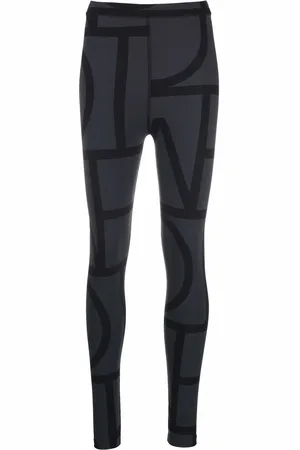 Totême Legging bicolore à imprimé graphique