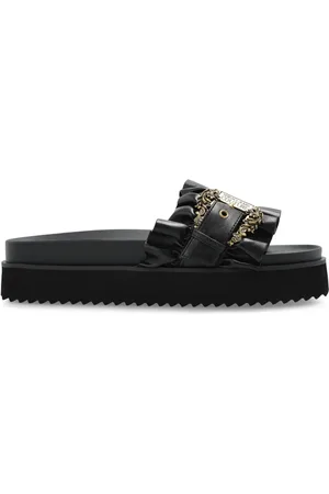 VERSACE Claquettes à logo gravé
