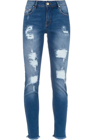AMAPÔ Jean skinny à effet usé