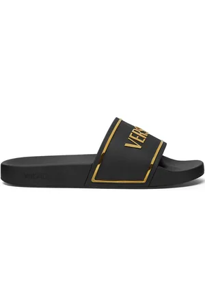 VERSACE Claquettes à logo imprimé