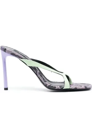 Sergio Rossi Mules Sr Aracne 95 mm à imprimé peau de serpent