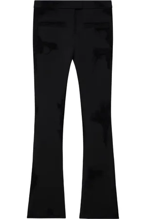 Courrèges Pantalon évasé à effet usé