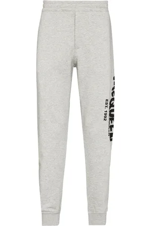 Alexander McQueen Pantalon de jogging à imprimé graffiti
