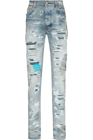 AMIRI Jean skinny à fini usé