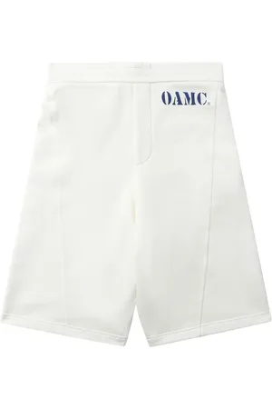 OAMC Short de sport en coton à logo imprimé