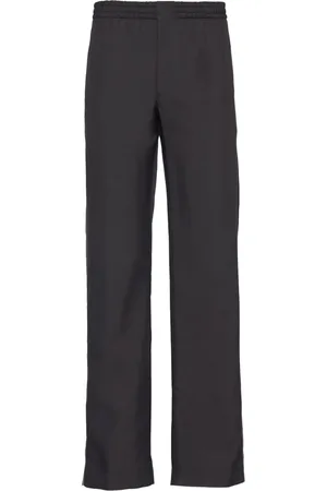 Prada Pantalon en soie à logo brodé