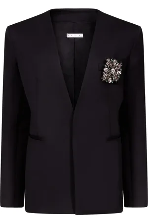 AREA Blazer sans col à broche ornée de cristaux