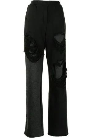GOEN.J Pantalon ample à effet usé