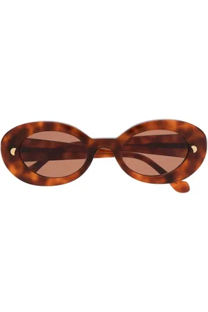 Nanushka Lunettes de soleil à effet écaille de tortue