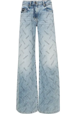 VERSACE Jean droit à logo orné de cristaux