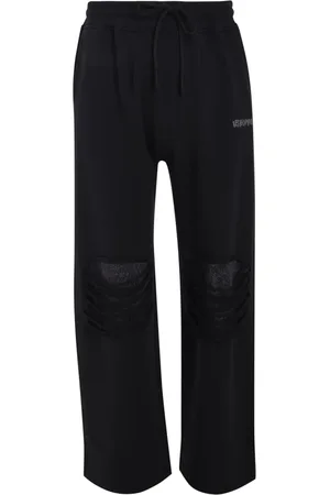 Les Benjamins Pantalon de jogging à effet usé