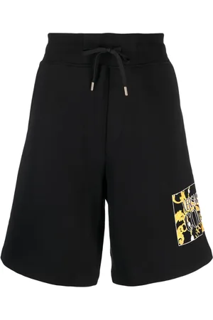 VERSACE Short de sport en coton à logo imprimé