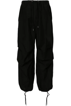 Acne Studios Pantalon ample à logo brodé