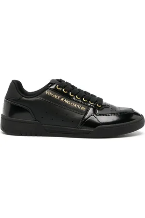 VERSACE Baskets en cuir à logo embossé