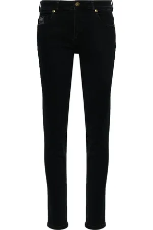 VERSACE Jean skinny à plaque logo
