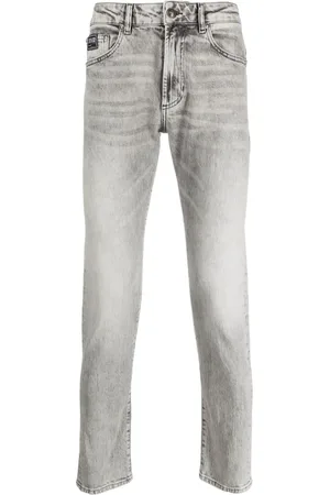 VERSACE Jean droit à effet délavé