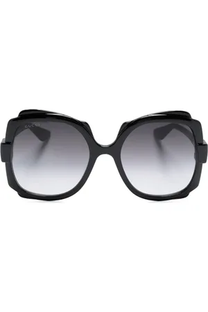 Gucci Lunettes de soleil carrées à logo gravé