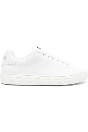 VERSACE Baskets Greca embossées en cuir