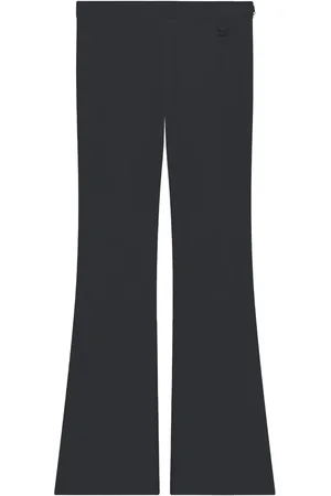 Courrèges Pantalon évasé à logo brodé