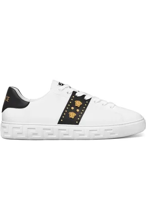 VERSACE Baskets cloutées Greca