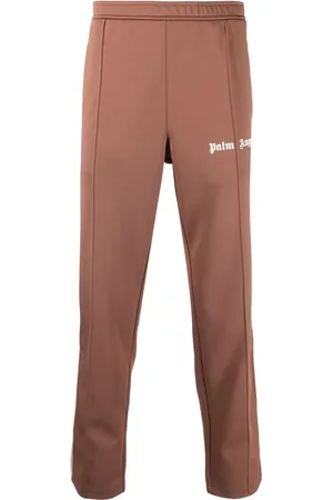 Palm Angels Pantalon de jogging à rayures latérales