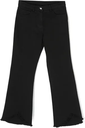 Twin-Set Jean asymétrique à bords francs