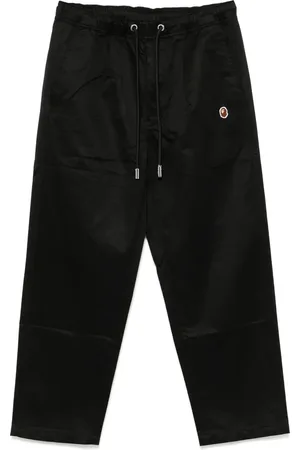 A Bathing Ape Pantalon à coupe évasée