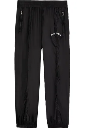 Palm Angels Pantalon de jogging à logo incurvé