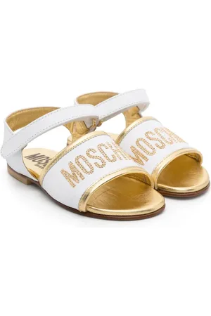 Moschino Sandales en cuir à logo strassé