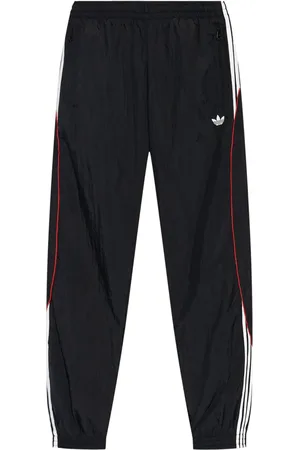 adidas Pantalon de jogging Trefoil à détails rayés