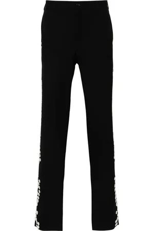 Comme des Garçons Pantalon à boutons décoratifs