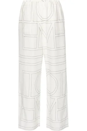 Totême Pantalon à logo brodé