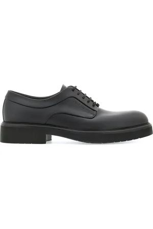 Salvatore Ferragamo Derbies en cuir à logo embossé