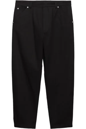 Prada Pantalon fuselé à plaque logo
