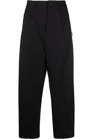 Nike Pantalon à poches zippées