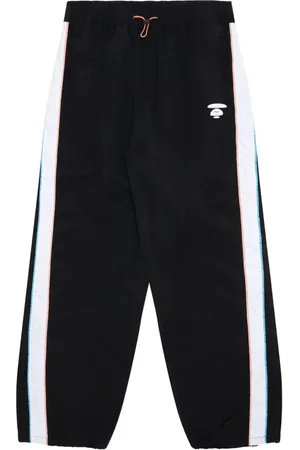 A Bathing Ape Pantalon ample à broderies Milo