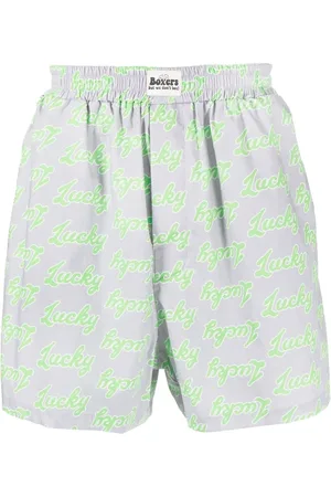 Natasha Zinko Short à slogan imprimé all-over