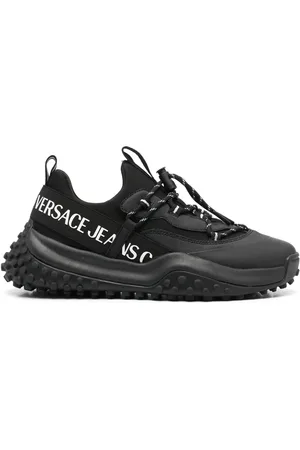 VERSACE Baskets à logo embossé