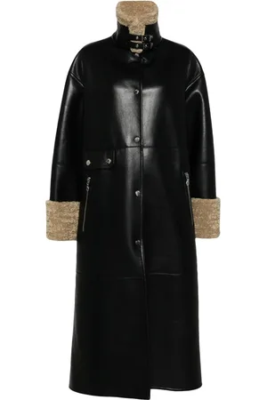 Nanushka Manteau à liserés en peau lainée