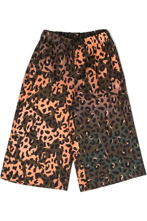 MARCELO BURLON Pantalon à imprimé animalier