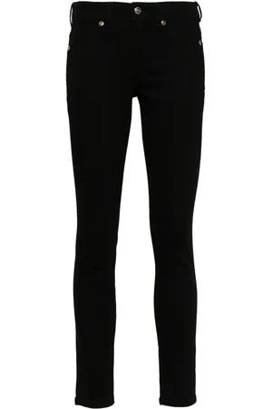 VERSACE Jean skinny à plaque logo