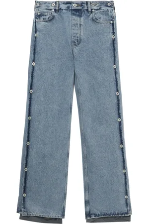 Y / PROJECT Jean à empiècements boutonnés